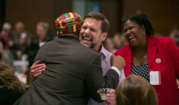 Tracy M. Downs and Rick Strickland hugging