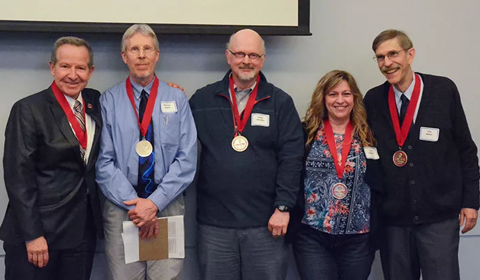 Michael Fiore, Steven Smith, Douglas Jorenby, Lisa Rogers, and Timothy Baker with medals around their necks