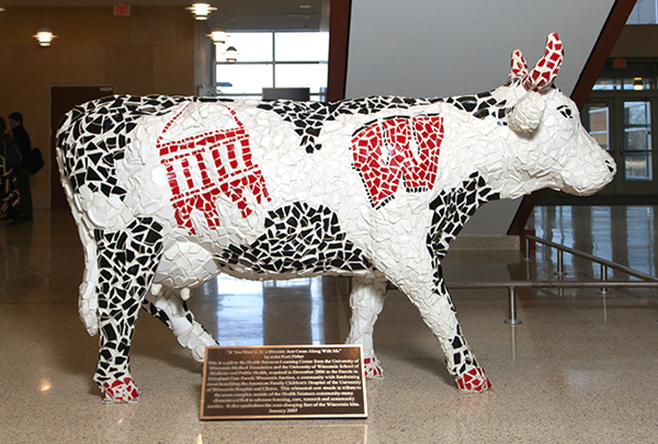 UW themed mosaic-covered cow in HSLC atrium