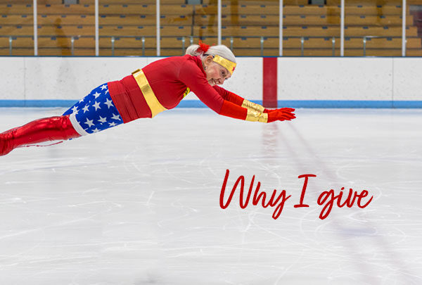 Marcia Richards dressed as a super hero with the text 'Why I give'