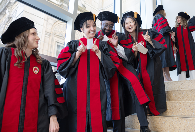 A group of students standing on stairs
