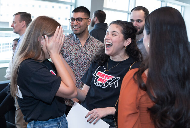 A woman smiles during the 2023 Match Day event