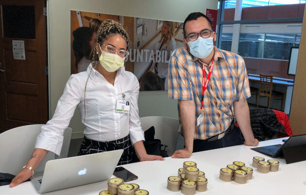 Liana Aubrey Dawson and Kevin Franco Valle sell candles for a cause