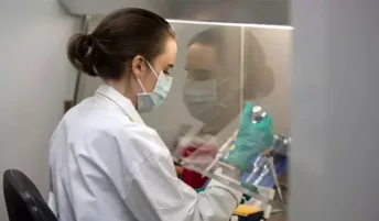 A researcher working in a lab