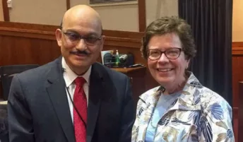Dr. Sanjay Asthana and Chancellor Rebecca Blank