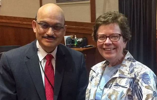 Dr. Sanjay Asthana and Chancellor Rebecca Blank