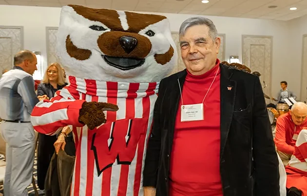Dennis Maki with Bucky Badger