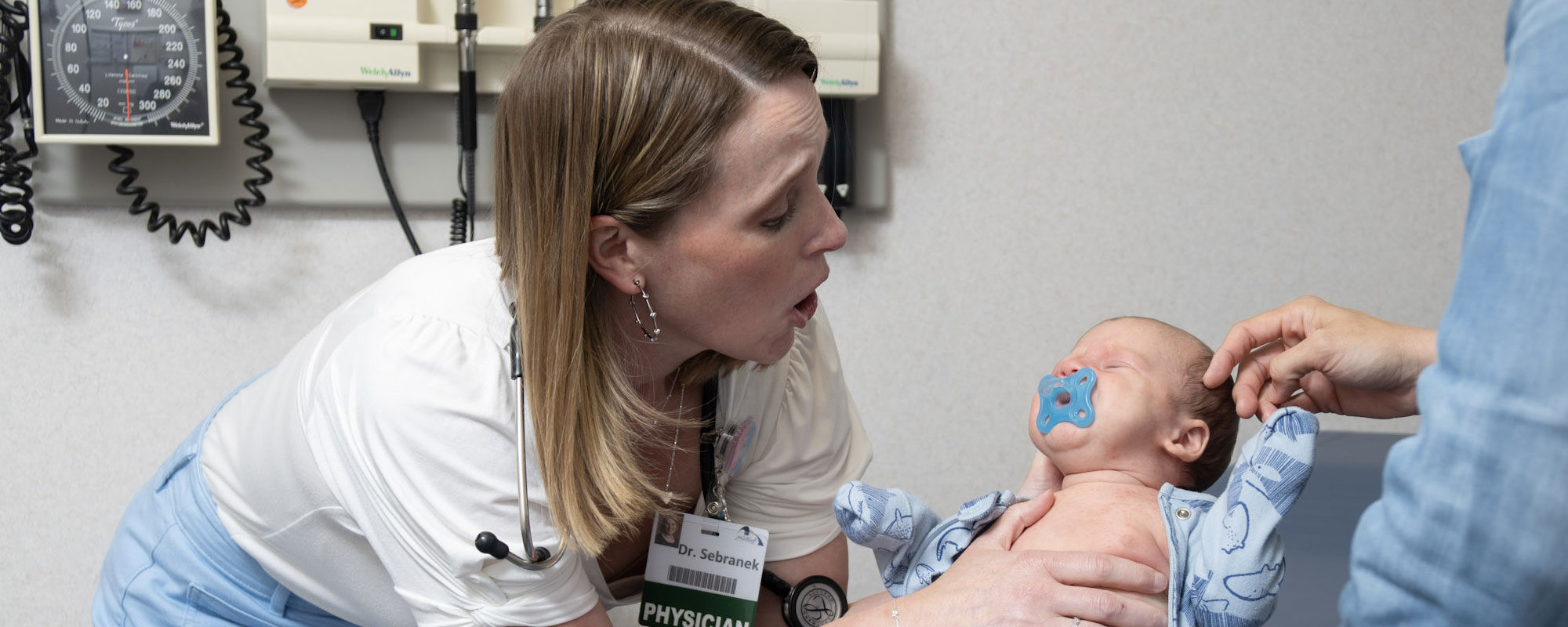 Jenna Sebranek examines a baby she delivered.