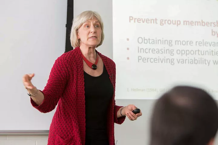 A woman giving a presentation