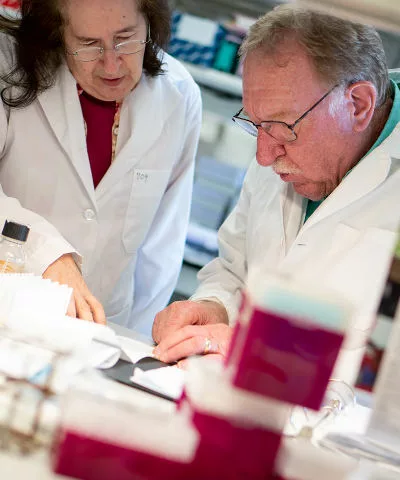 Two scientists working together in a lab